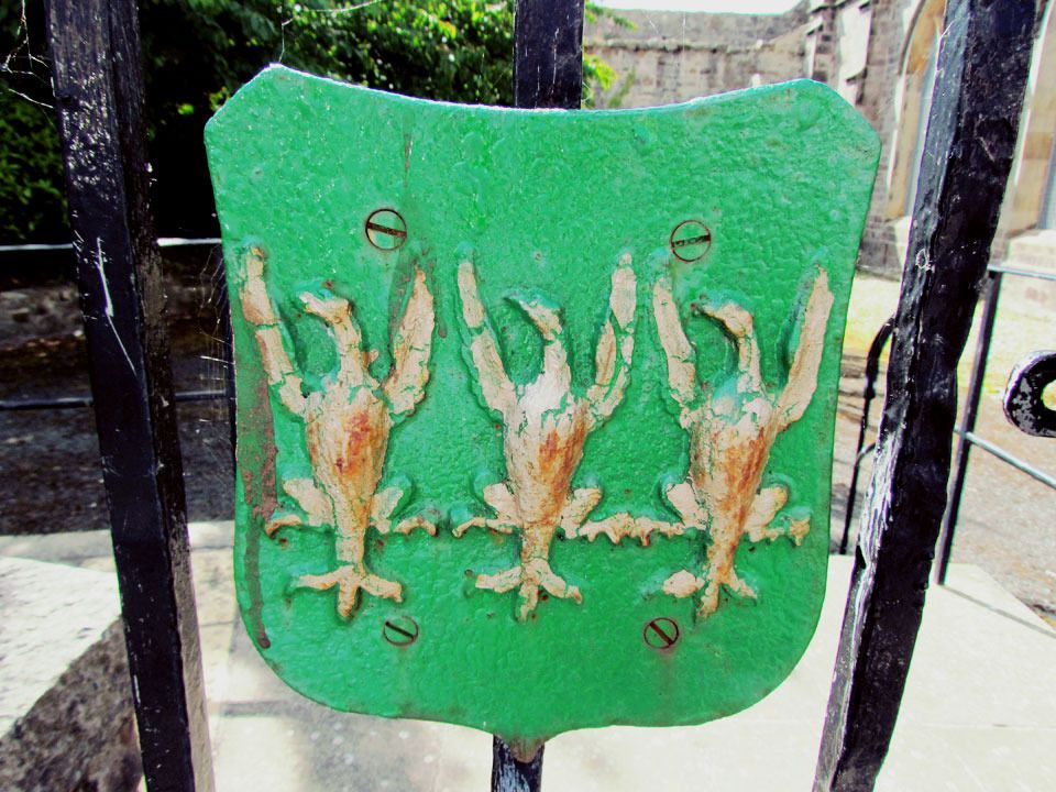 three golden eagles on a green shield St Mary's church
