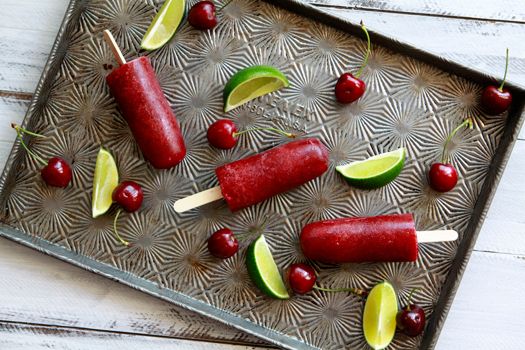 Cherry Limeade Popsicles recipe by Simple Bites