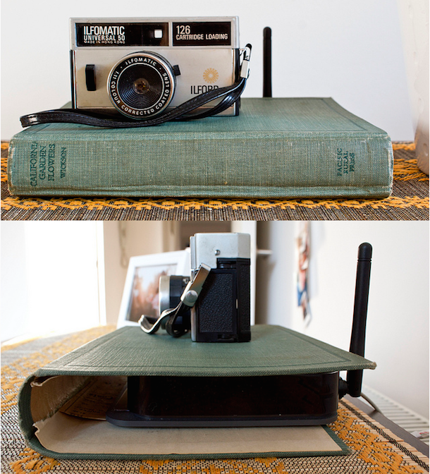 Cool Mom Tech organization tip: Hide an unsightly router in a hollowed out book cover, photo by Ana Maria Munoz.