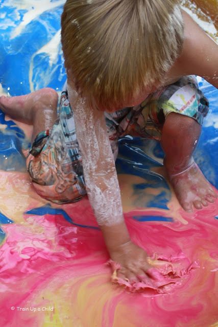 Messy play with kids: Colorful oobleck by Train up a Child