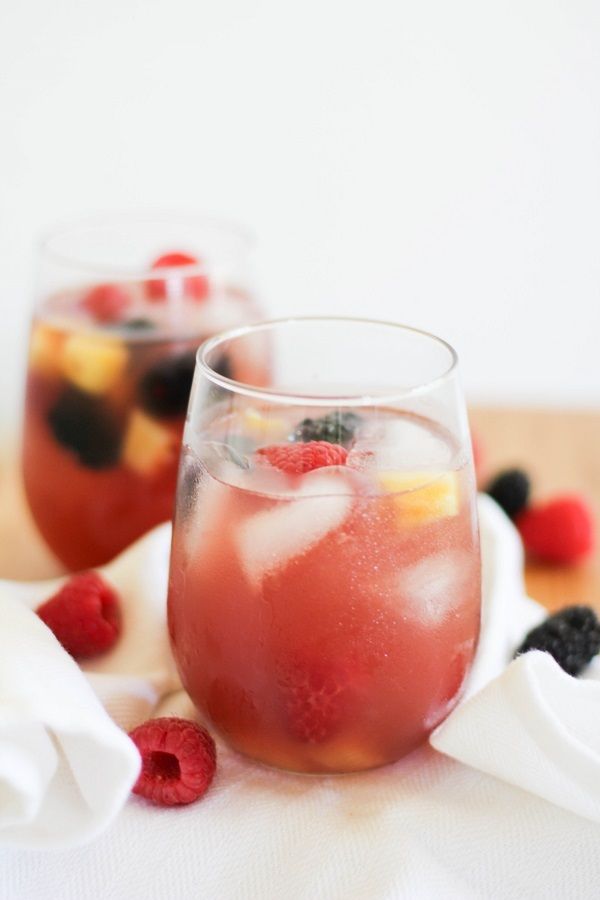 A summery take on a favorite big batch cocktail: Pineapple Sangria made with Rose wine |The Roasted Root