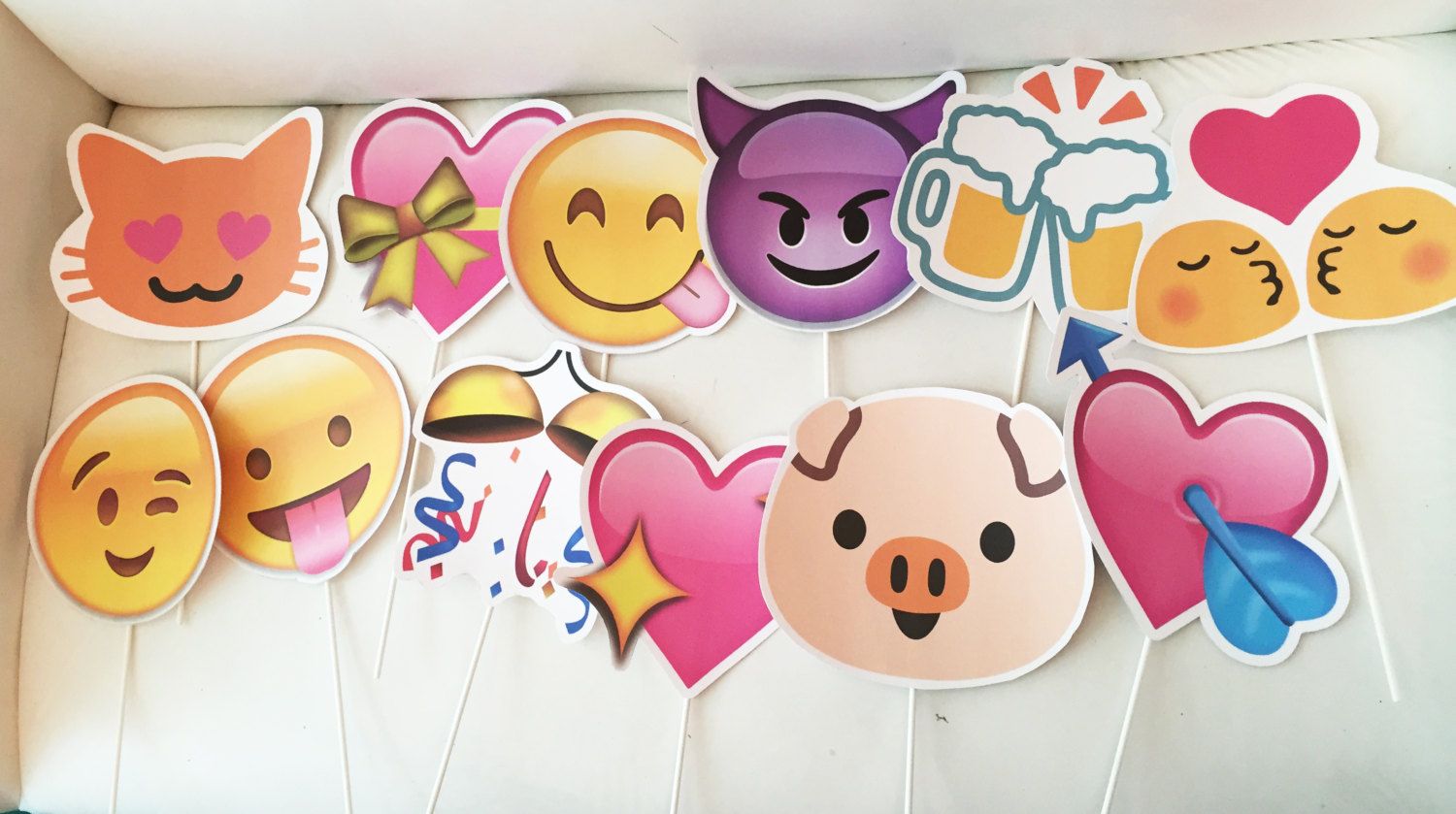 Emoji photo book props via Imagine Event Boutique