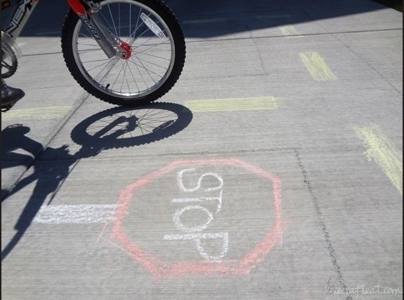 How to make driveway bike riding more fun: Bike Safety practice ideas via Melissa & Doug