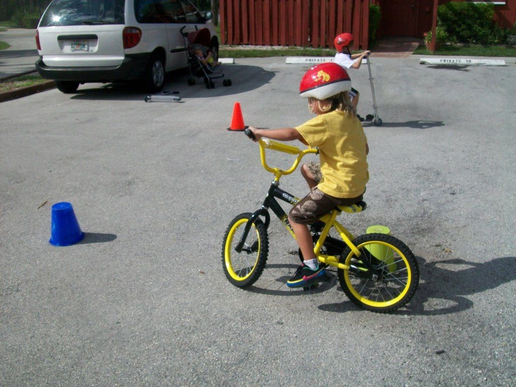 Making driveway bike riding more fun: Bicycle obstacle course from Home Grown Families