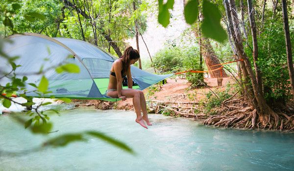 For an adventurous date night, go camping over a river in a Tentsile tent.