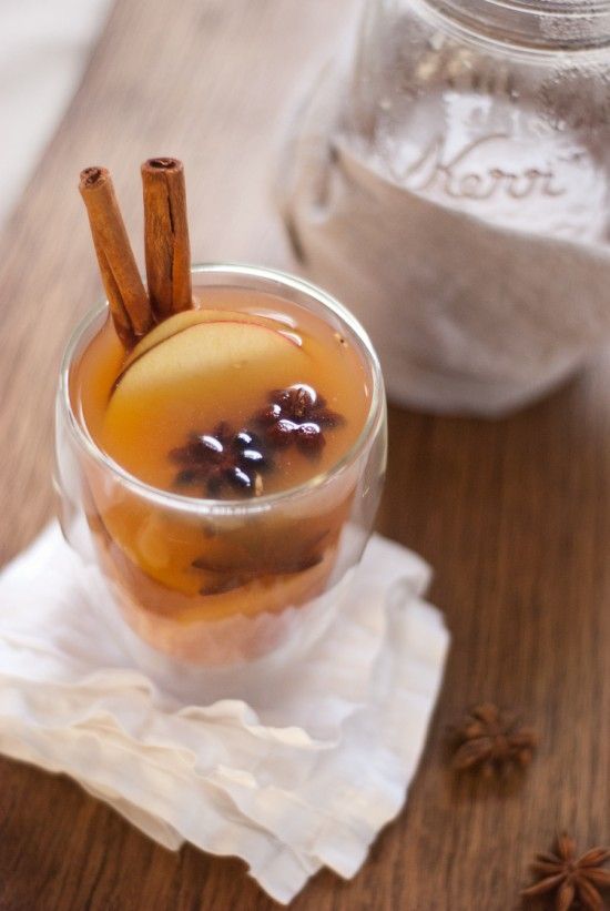 Warm mulled cider with lemon, vanilla and spices make this Wassail Cocktail a perfect holiday drink. Add some bourbon, or skip the booze for a family friendly version. | Cookie + Kate