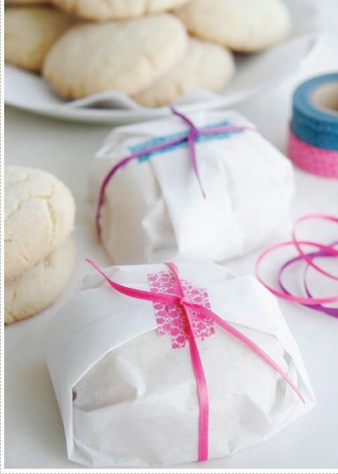 Christmas cookie gifts wrapped in parchment circles illustrated on 