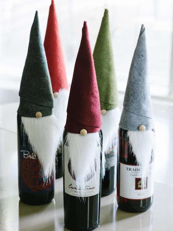 Of all the wasy ways to wrap wine as a gift, this DIY elf disguise is the most creative. So cute! |HGTV