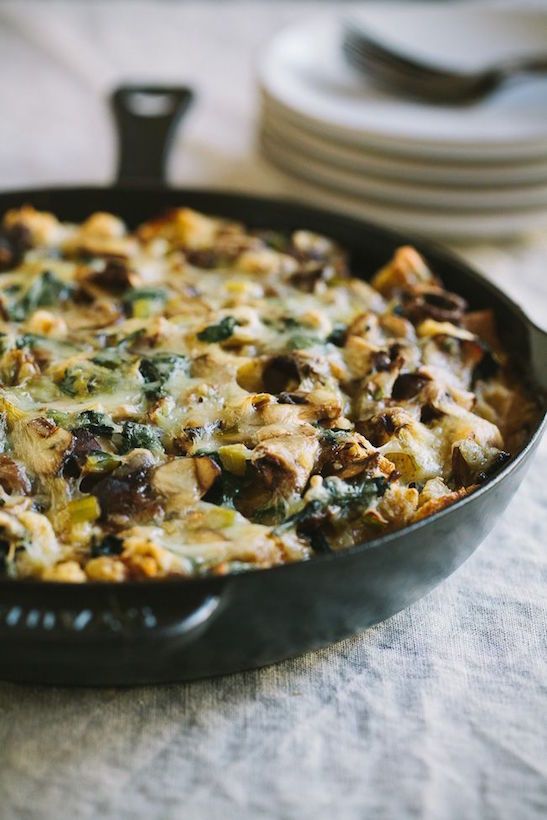 Make-ahead holiday breakfast recipes: vegetarian Wild Mushroom and Leek Strata is packed with whole wheat bread, sautéed veggies and melted cheese. | Gather and DIne