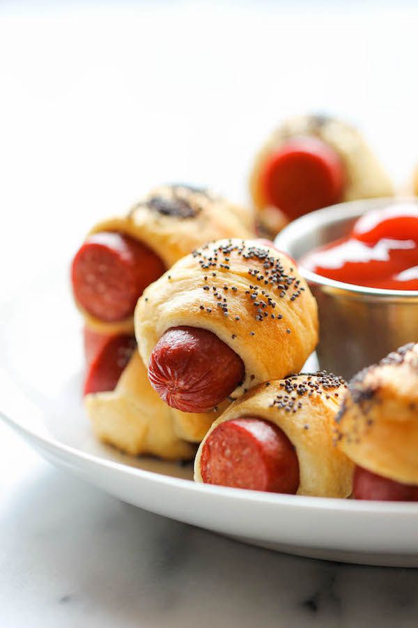Pigs in a Blanket are a great New Year's Eve dinner ideas for kids, especially you serve them with our sauce ideas to make them good for grown ups, too! | Damn Delicious