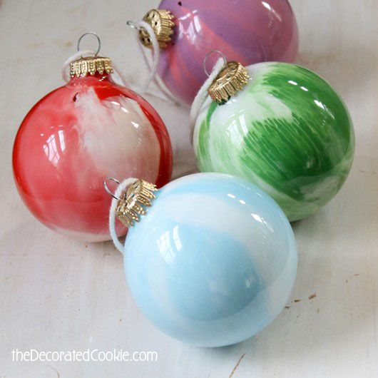 Swirled paint ornaments for kids from The Decorated Cookie