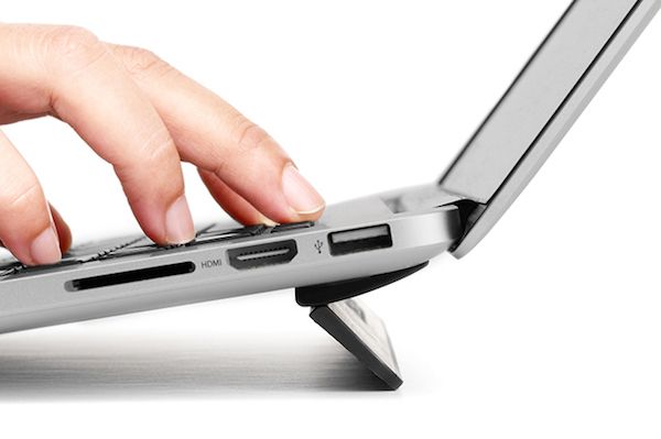 The Kickflip laptop stand adheres to your MacBook for portability