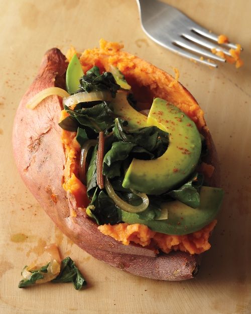 Baked sweet potato stuffed with greens and avocado | Whole Living