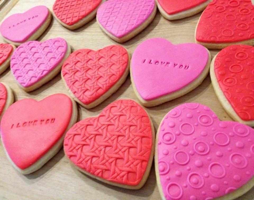 Cool Valentine's cookies: Embossed fondant heart from CupCakes by Joanne on Etsy