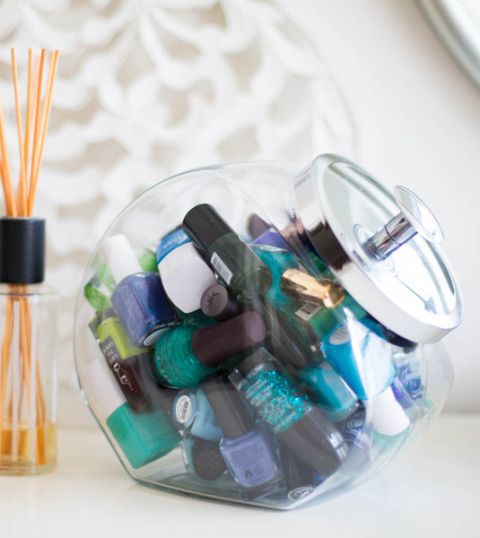 Store your nail polish bottles in a glass cookie jar. Brilliant idea from Cosmopolitan magazine.