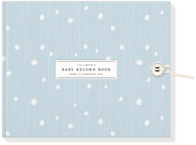 Photo gift ideas for baby showers: Fill a beautiful baby book with notes and photos from all the guests