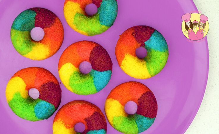 Get baking with kids! These Rainbow Doughnuts are a perfect project for kids to make at a sleepover—then breakfast the next day is done! | Charli's Crafty Kitchen