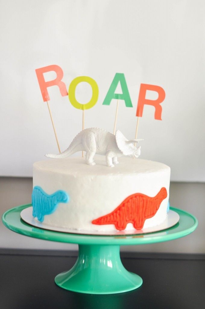This dinosaur birthday party cake is store-bought and made perfect with a few simple decorating hacks | Live the Fancy Life