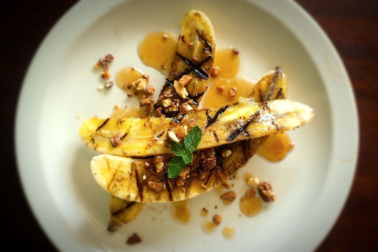 Grilled fruit recipes: Grilled Bananas with Buttered Maple Sauce and English Toffee | Food52