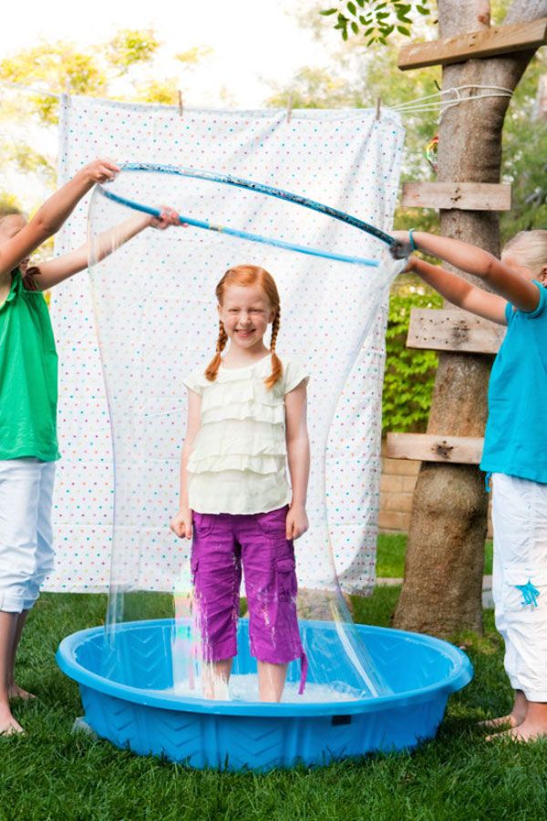 block party ideas: Let the kids play with bubbles! So fun. | photo cred: One Charming Party