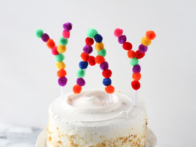 cake decorating ideas: write your message in pom pom balls via Momtastic