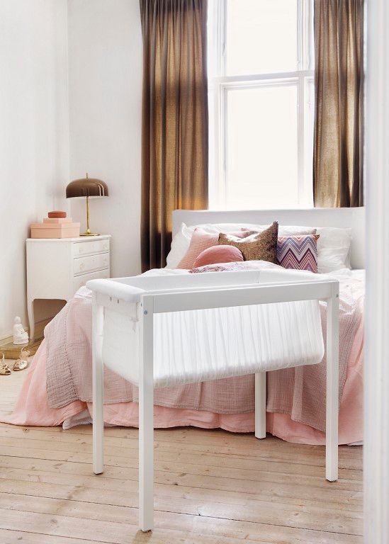 Stokke Home furniture: The portable cradle can be removed and placed inside the crib