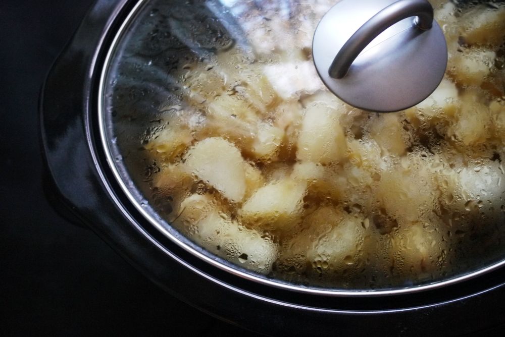 How to cook mashed potatoes in a slow cooker: Set on high for 4 hours and allow potatoes to cook | Cool Mom Eats