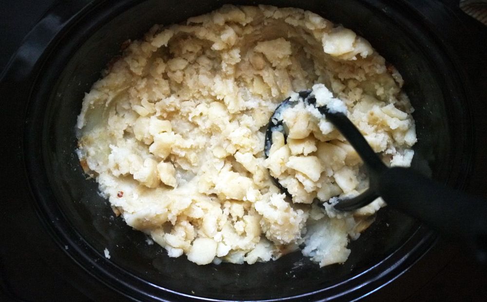 How to cook mashed potatoes in a slow cooker: Mash the cooked potatoes right in the insert | Cool Mom Eats