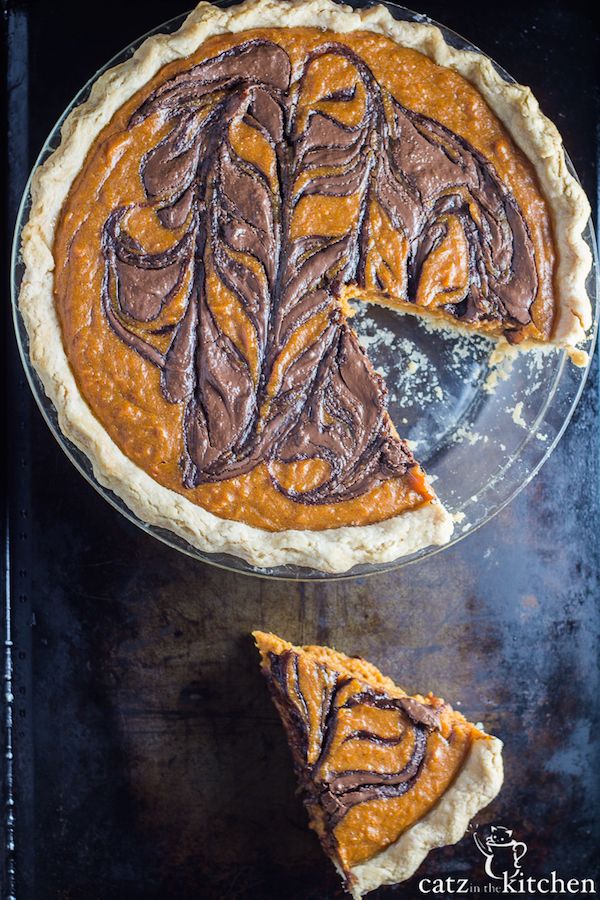 Give classic sweet potato pie a modern upgrade with this Nutella Swirled Sweet Potato Pie | Catz in the Kitchen