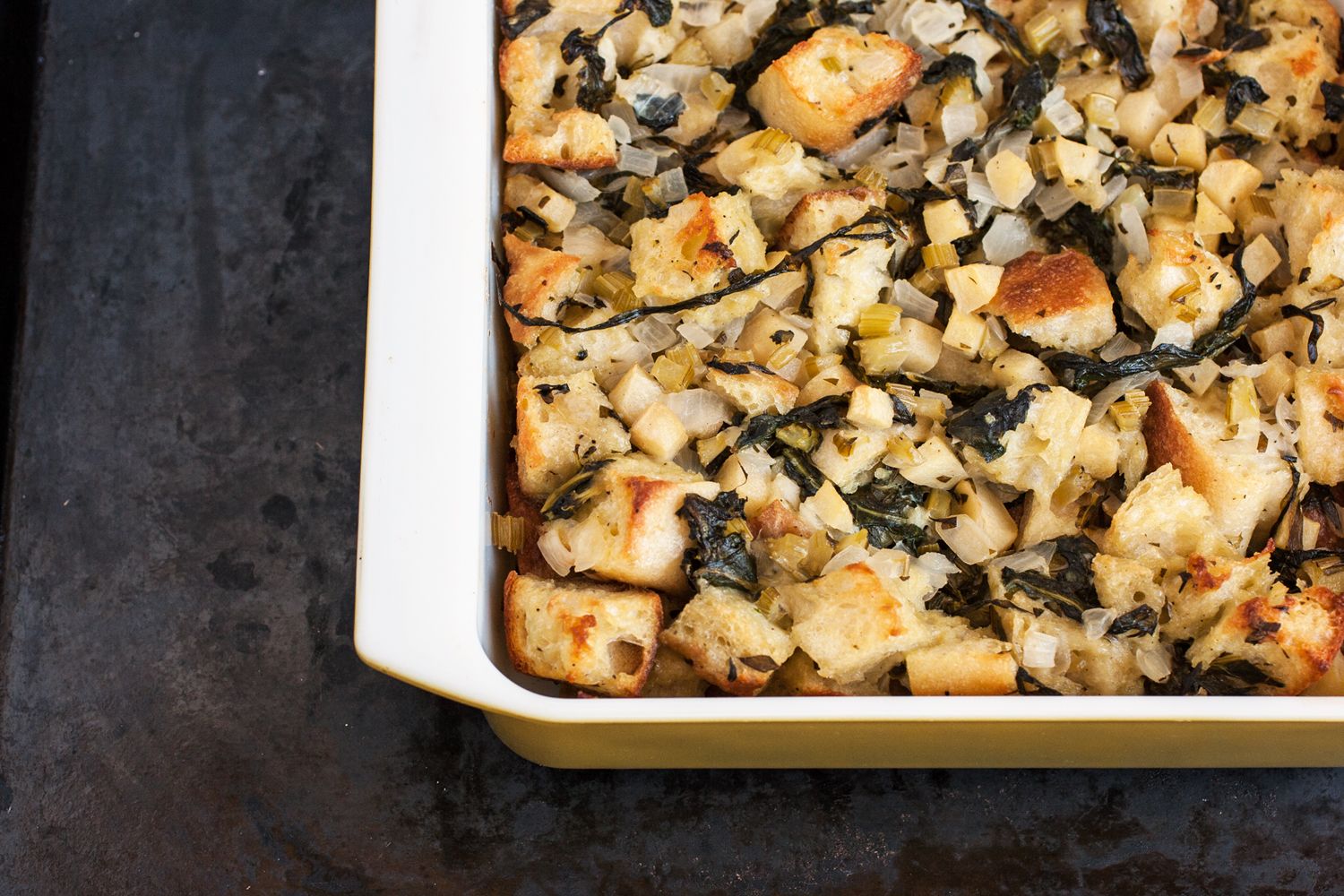 Chard Apple Stuffing from the 8x8 Cookbook by Kathy Strahs makes an easy weeknight side or even holiday dish! 