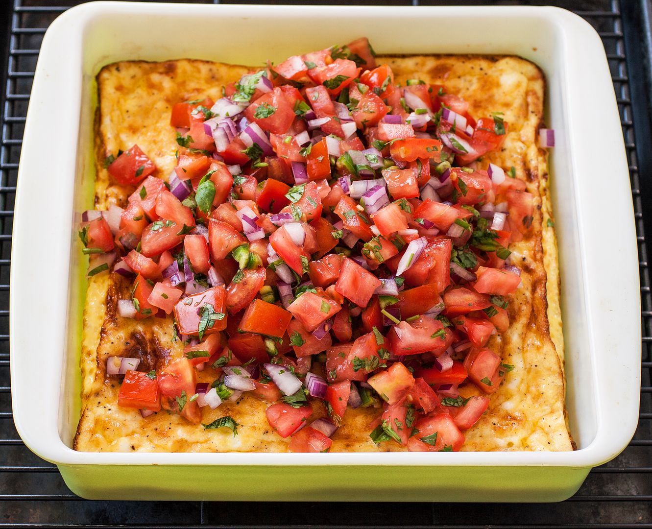 Brunch doesn't get any easier than this delicious Fluffy Baked Omelet with Pico de Gallo from the 8x8 Cookbook by Kathy Strahs