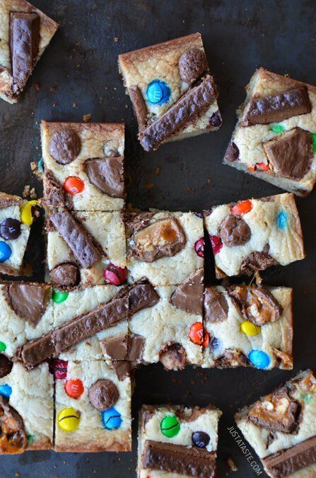 These Halloween Candy Blondies are one of our favorite ways to use leftover candy from the Halloween haul | Just a Taste