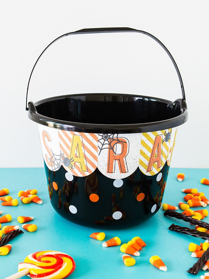 Free printable, personalized Hallowen treat bag stickers to help decorate buckets from Sarah Hearts