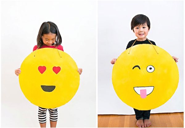 Last-minute Halloween costumes for kids: All you need is yellow poster board and some markers to make these cute Emoji costumes at Hello, Wonderful.