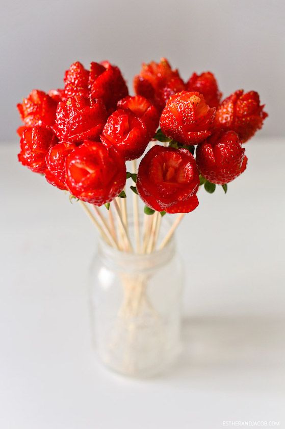 Hand-cut strawberry flowers are a very impressive way to serve fruit at a party | Local Adventurer