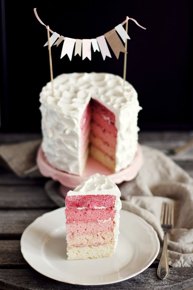 We love this modern gender reveal cake that uses pink just right in an ombre design. | Call Me Cupcake