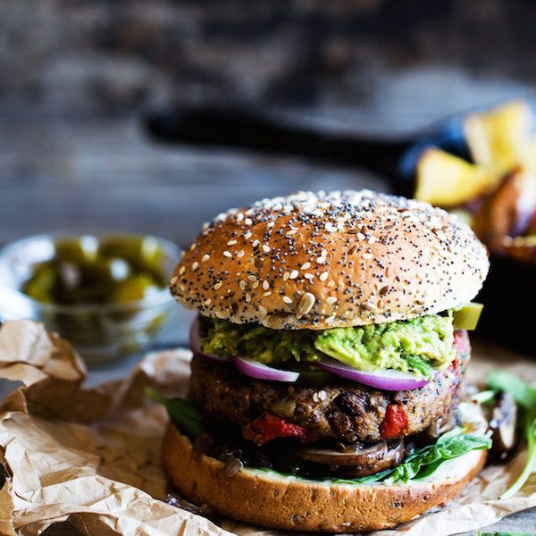 These Eggplant and Black Bean burgers are so savory and hearty, that the kids might not notice this is a vegetarian #MeatlessMonday meal (just add cheese instead of guac and lots of ketchup!) | Dreamy Leaf