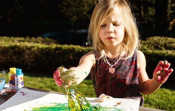 Fall nature crafts for preschoolers: painting with branches DIY project at Adventure Ahead by KinderCare