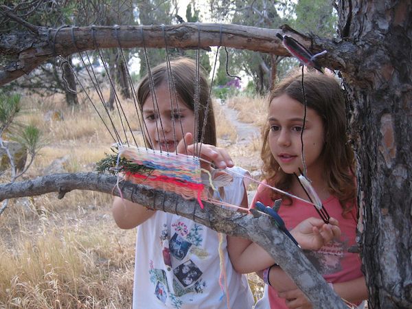 fall nature crafts for preschoolers: tree branch weaving via Ergani Weaving on Flickr