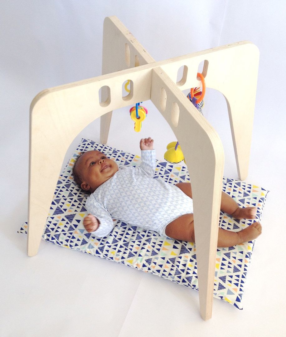 Nin and June's wooden baby play gym on Etsy