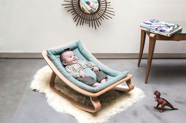 The beautiful wooden LEVO rocker is a modern baby bouncer you'll keep for generations.