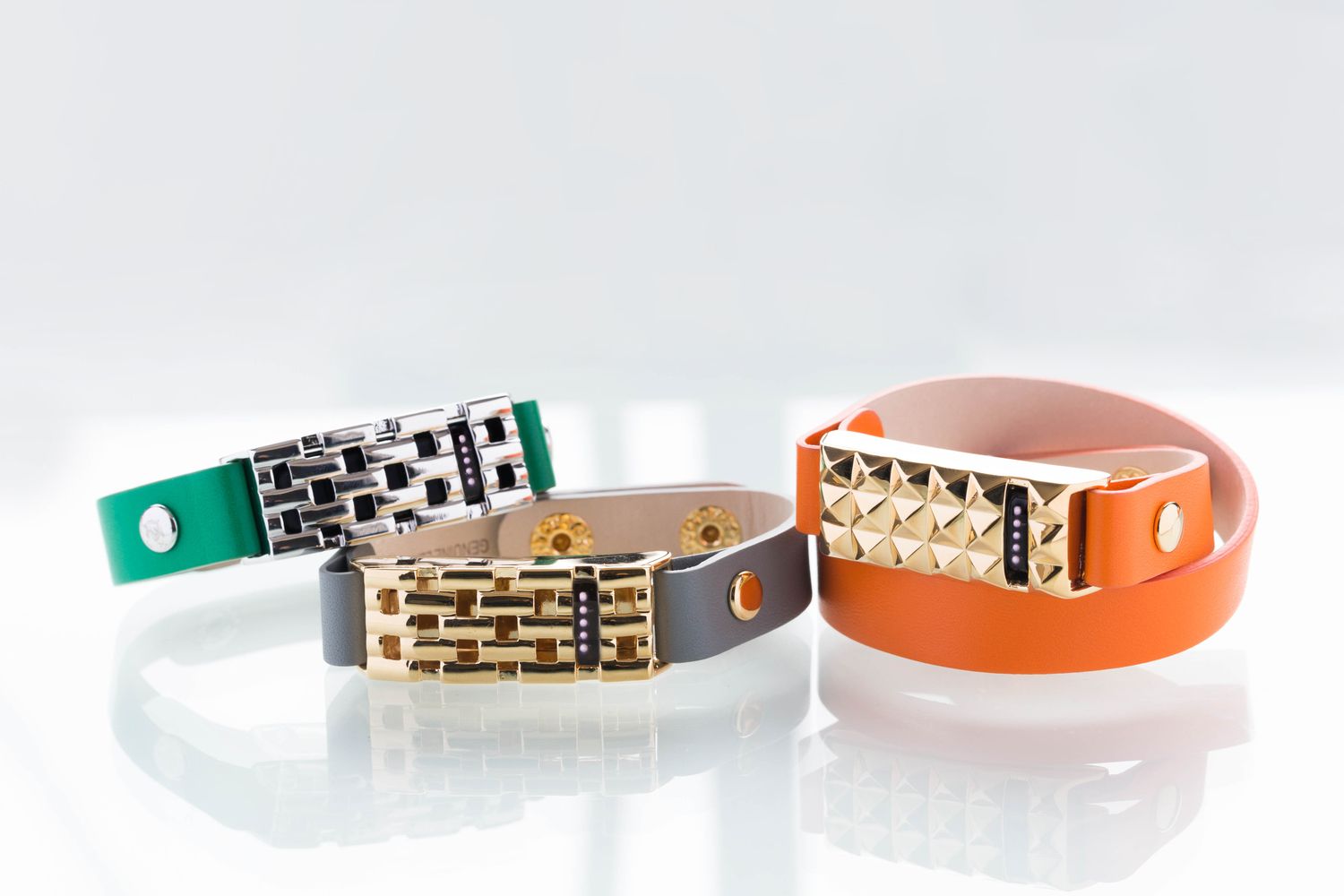 Bezels & Bytes Fitbit leather jewelry: Studs and basket weave, with a bright leather band
