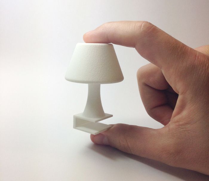 The tiny Ibat-Jour lamp slides onto your iPhone for an adorably soft glow at night.