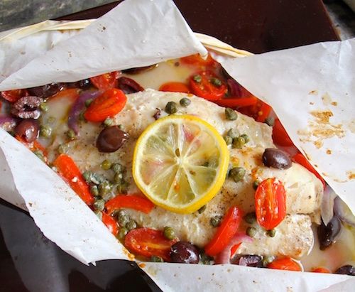 Easy New Year's dinner recipes don't have to skimp on presentation. The Mediterranean Fish en Papillote is easy prep and cleanup, but looks–and tastes–divine. | From A Chef’s Kitchen 