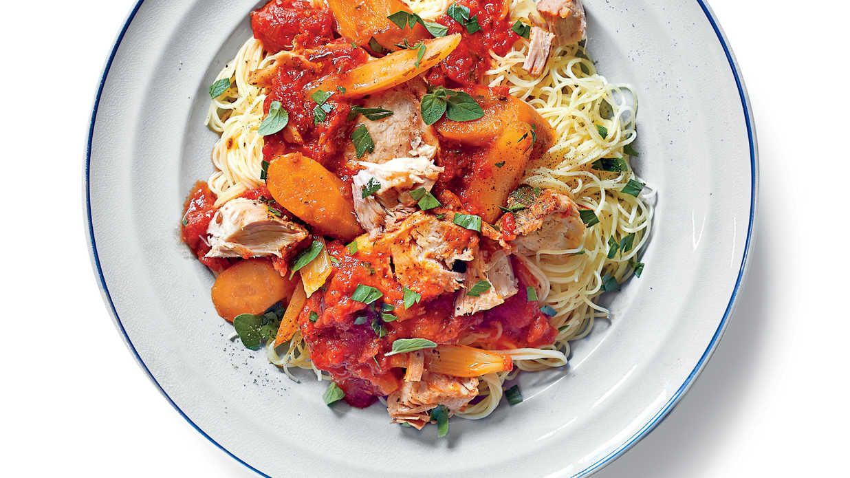 Amazing holiday dinner recipes made easier with our favorite store-bought shortcut: Sow Cooker Parmesan Pork Loin in Tomato Sauce at Southern Living