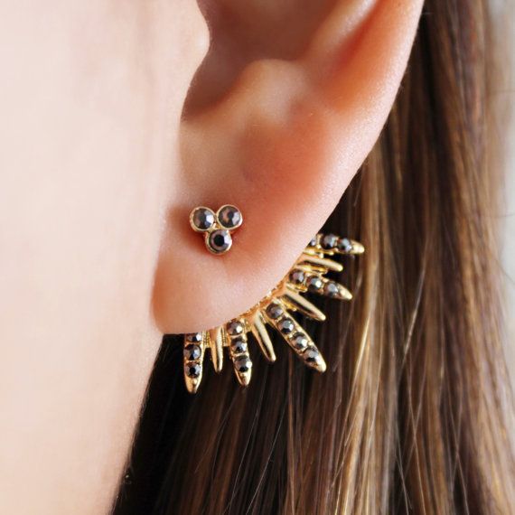 Statement jewelry under $50: Spikey ear jackets from Mas Femme on Etsy are edgy and glitzy.