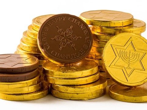 Gold coins from Li-Lac Chocolates have the traditional menorah on the wrapper and dreidel designs inside.
