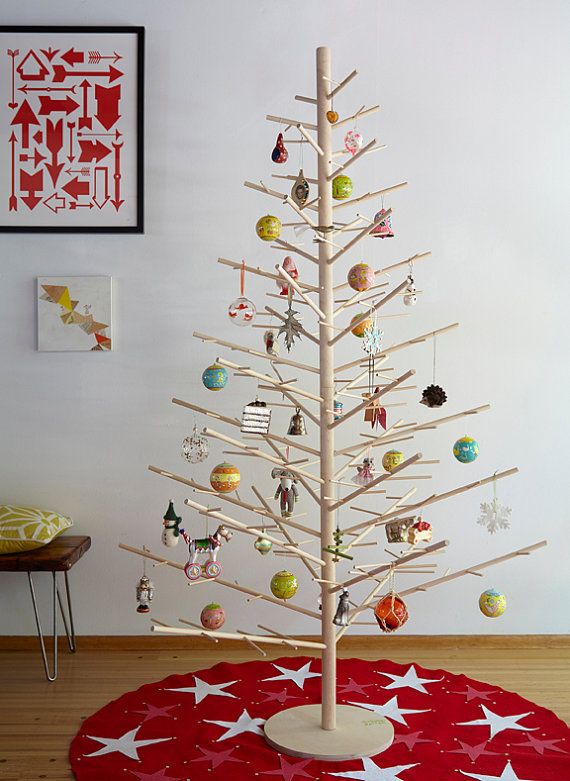 Every ornament can be seen on this minimalist wooden tree from ReTreeJoy on Etsy.