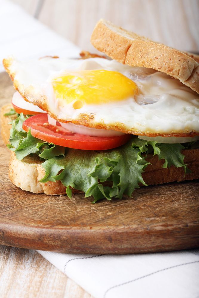 How to build a perfect breakfast sandwich: Top it with a just slightly runny fried egg or a folded omelet with toppings mixed in. | Cool Mom Eats