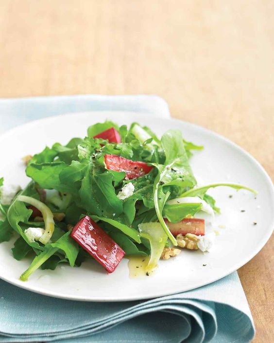 How to pick rhubarb: A quick roasting of rhubarb and walnuts adds a layer of tart and crunch to this Rhubarb Salad with Goat Cheese. | Martha Stewart